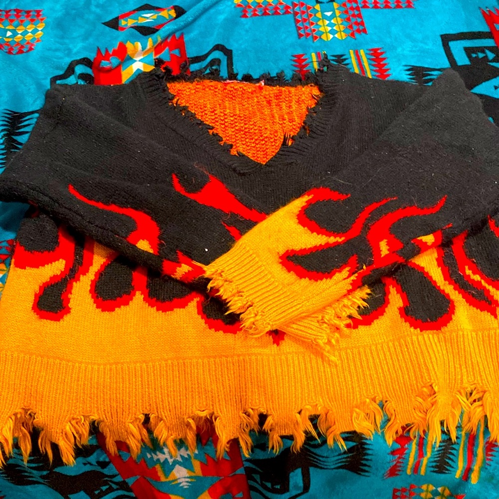 A flame patterned cardigan from shien